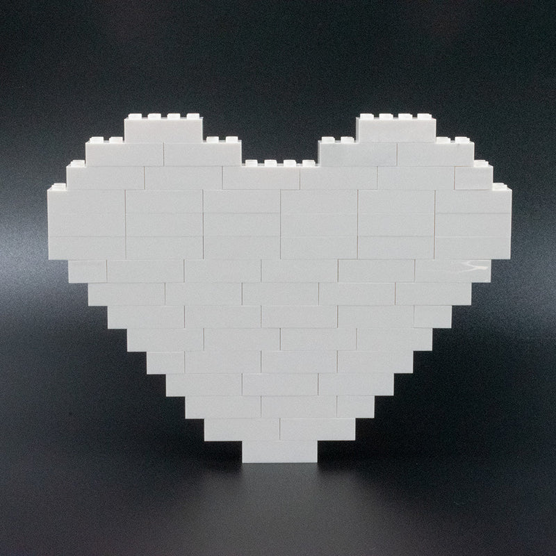 Premium Photo  Build a designer lego heart. selective background.